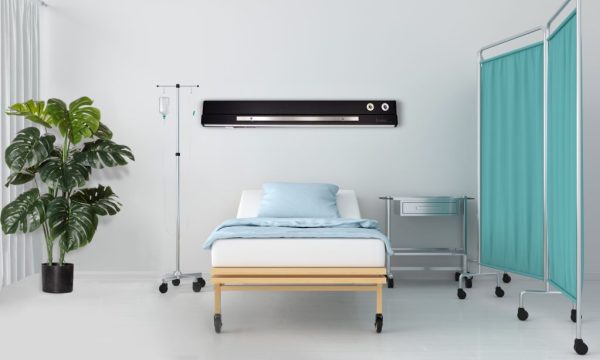 Hospital room with bed and table, 3D rendering